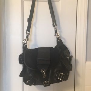 Beautiful DIOR bag with a lot of silver hardware.